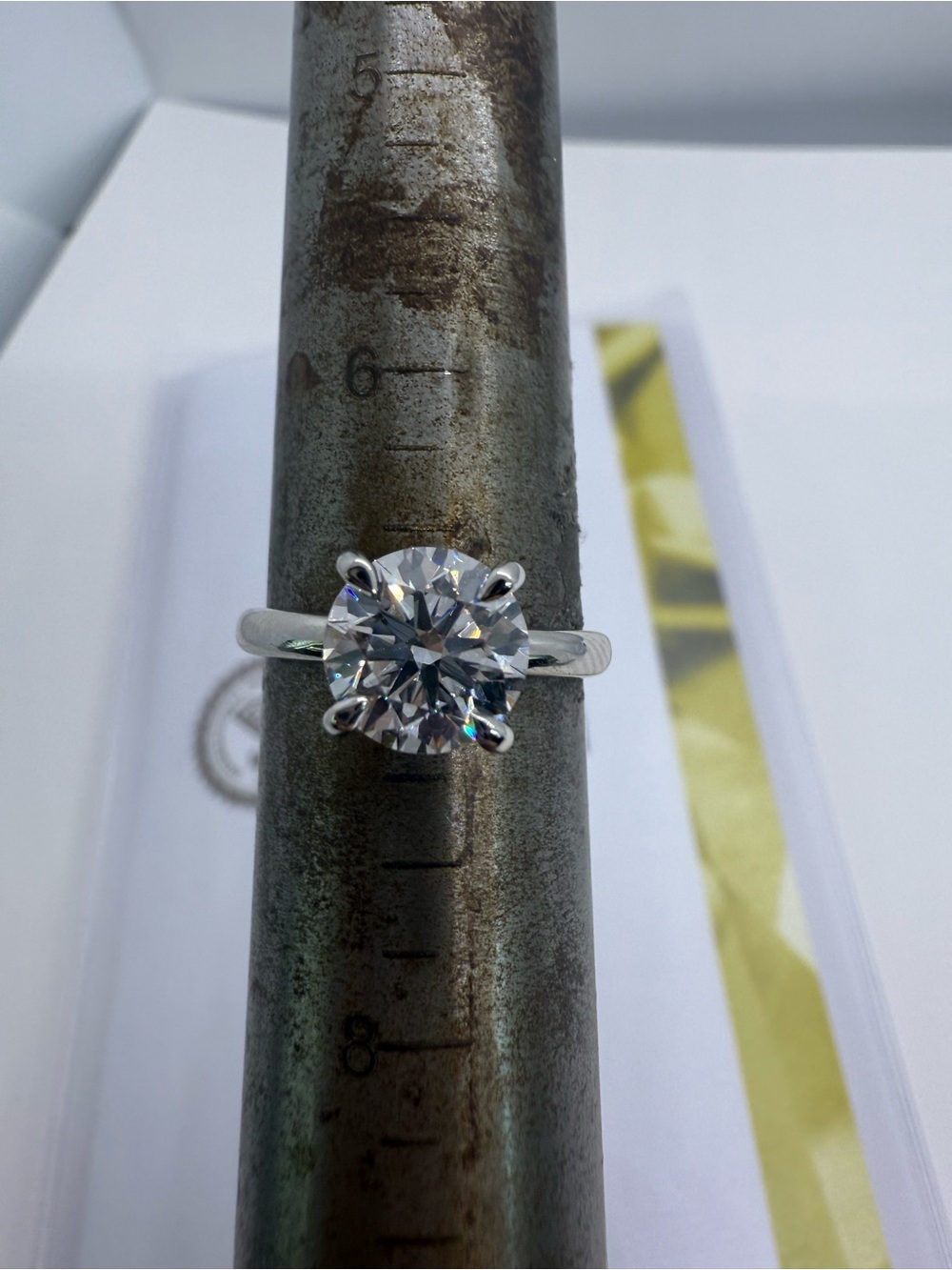 2.05 carat E VS1 round lab diamond solitaire in platinum engagement ring